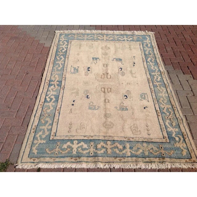 Gorgeous hand-knotted area rug made in early 1900s by Anatolian tribes. This collectible rug is made with all hand spun...