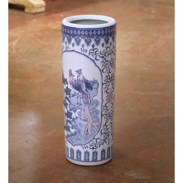 This elegant late 20th century porcelain umbrella stand, crafted circa 1990, features a classic cylindrical form inspired...
