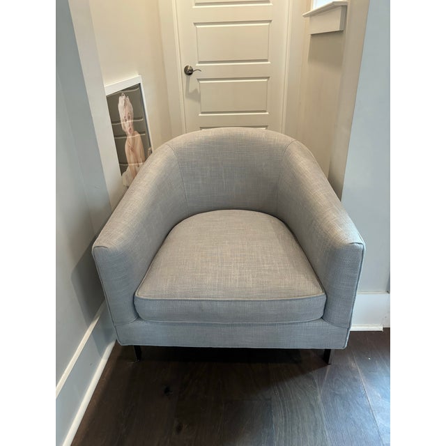This 1970s-inspired Restoration Hardware Reginald Chair is upholstered in an Italian gray/fog weave. It is supported by a...
