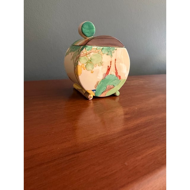 Exceptional covered sugar bowl from the Stamford tea ware line designed by Clarice Cliff and produced by Newport Pottery...