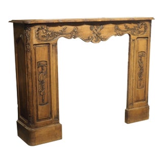 Circa 1870 French Walnut Fireplace Mantel With Trophies of Music and the Arts For Sale