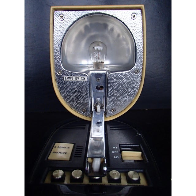 Table Lamp with Alarm Clock from Timco, 1970s, in Good conditions. Designed 1970 to 1979 This piece has an attribution...