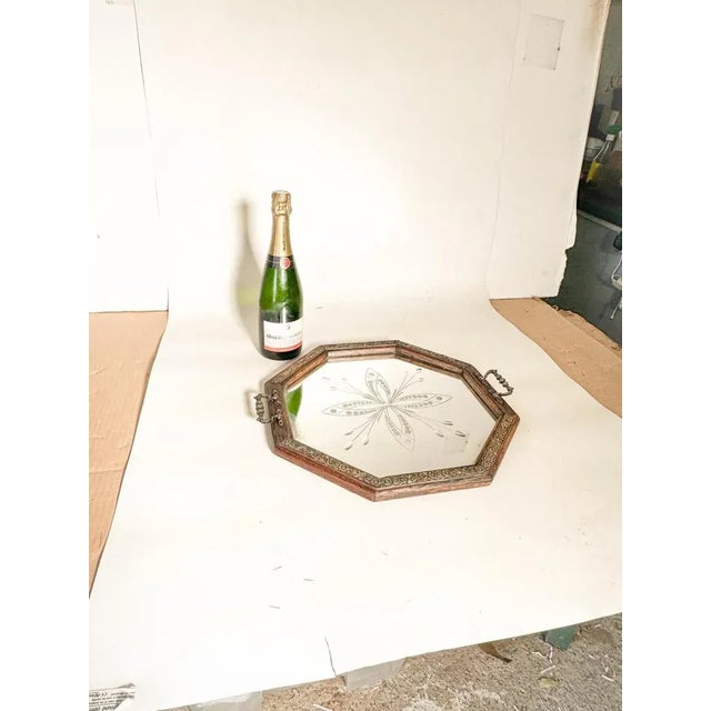 Art Deco mirror, made in the 1940s in France. It is made of Beveled mirror, with Saint Gobain Art Glass. It is in good...