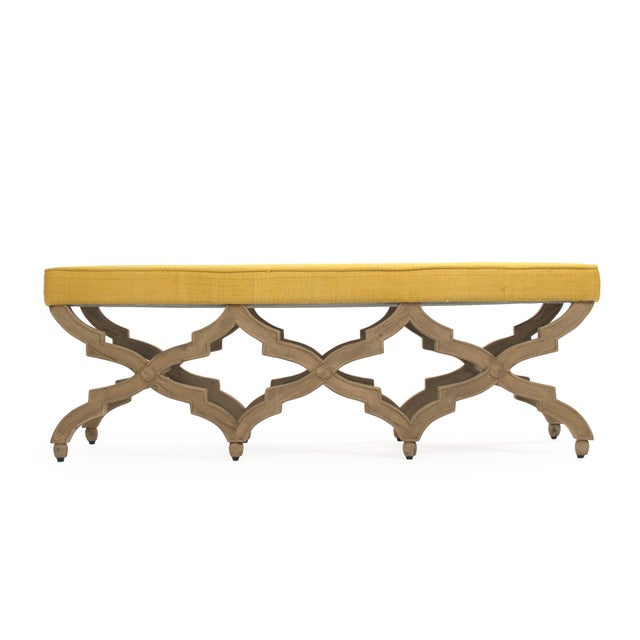 The Judith Bench from Zentique is a French country upholstered bench with a padded yellow raw silk seat on a natural birch...