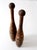 This pair of antique Indian clubs, also known as juggling pins, features a slender silhouette with a beautiful patina...