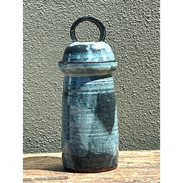 This striking vintage studio pottery lidded jar is a beautiful example of late 20th-century ceramic artistry. Hand-thrown...