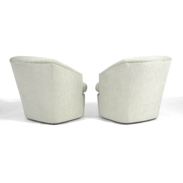 These two handsome and well made barrel back chairs are unmarked, but very similar to designs by Milo Baughman. Deep,...