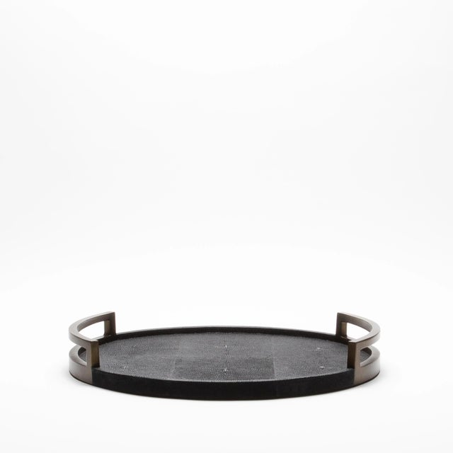 This round tray by R&Y Augousti is the epitome of opulence, where artistry and luxury converge in perfect harmony. The...