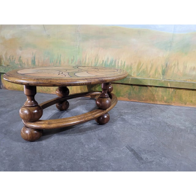 Solid oak and ceramic coffee table from the 1970s. What a lovely model, with its top made of oak partitions into which...