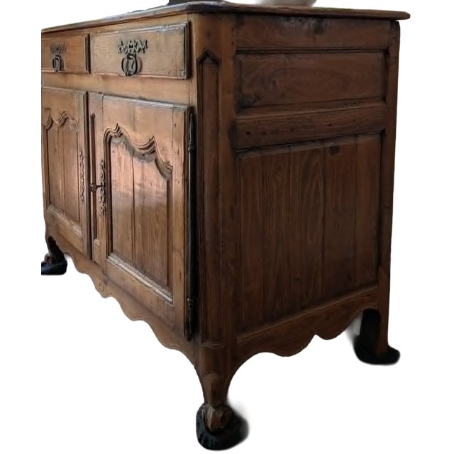 A wonderful example of 18th-century French cabinetry, this two-door buffet embodies the warmth and honest construction the...