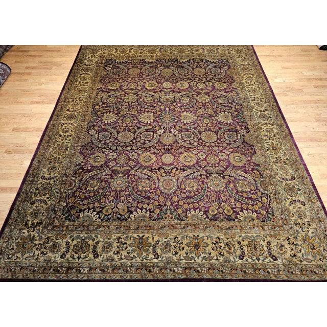 This exquisite vintage Kerman-style oversize rug, crafted in the late 20th century, is a striking homage to the opulent...