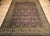This exquisite vintage Kerman-style oversize rug, crafted in the late 20th century, is a striking homage to the opulent...
