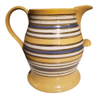 Large Mocha Yellow Ware Jug With Blue, White and Brown Slip Bands and Shell Grip For Sale