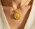 Material: 14K Yellow Gold - durable and elegant Design: Italian Coin Pendant with detailed embossing Style: Classic /...