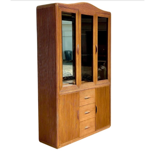 Rare, Vintage pencil reed, mid century modern, Display storage cabinet. Few china like cabinets provide perfect balance of...