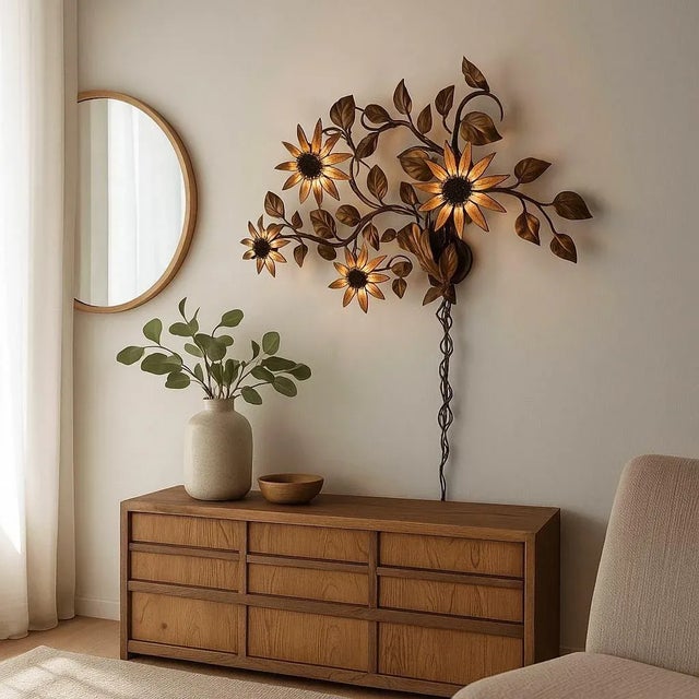 Bring timeless design into your home with this vintage Italian gilt tole sunflower wall sconce. Design: Crafted in the...