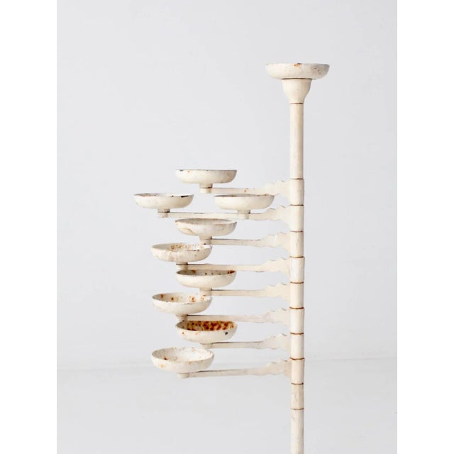 This is a Victorian cast iron plant stand. The captivating display piece, wearing its original now perfectly oxidized...