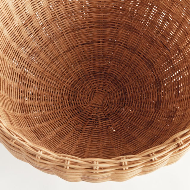 Doublewalled and scaled to impress, this 24inch rattan woven footed bowl is a stunner. With beautiful varying natural...