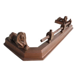 Mid-Century Egyptian Revival Fireplace Fender with Reclining Sphinxes and Turned Rod Detailing For Sale