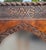 Handmade Berber‑style wooden mirror featuring intricate geometric carvings and a pointed‑arch glass center. Crafted with...