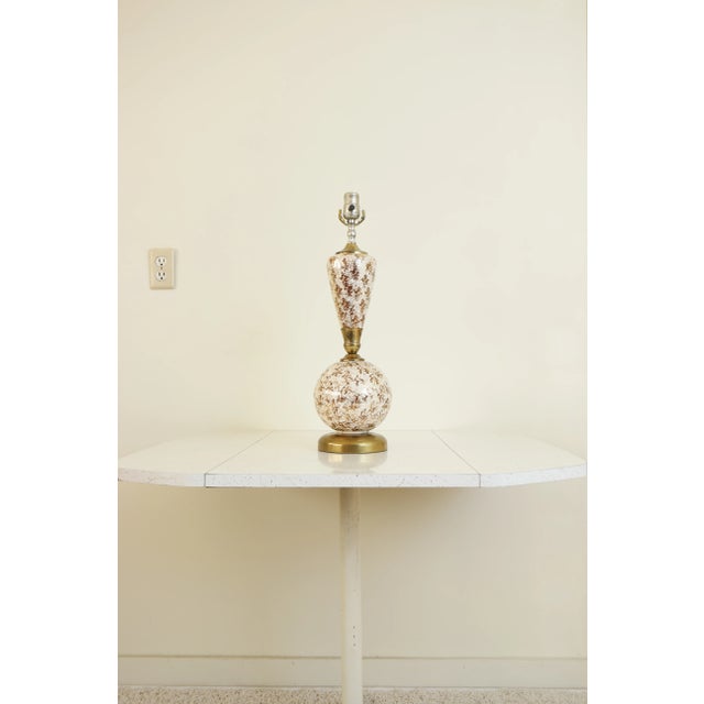 A vintage table lamp, made of ceramic & brass. In excellent condition, cosmetically and functionally. No chips, cracks, or...