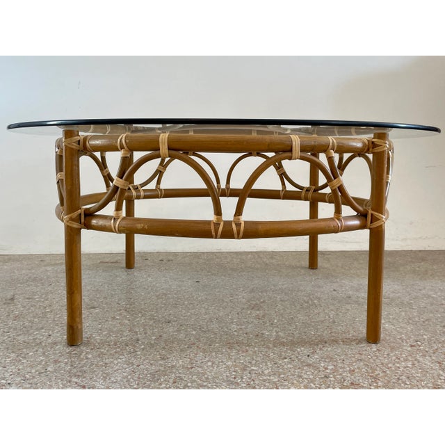 Fabulous round natural bamboo rattan coffee table with a round glass top. Great addition to your Boho Chic inspired...