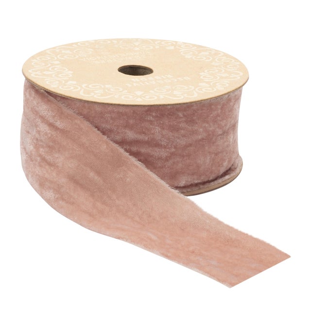Add a soft and sophisticated touch to your creative projects with our Raw Edge Velvet Ribbon in a gentle pink hue. Made...