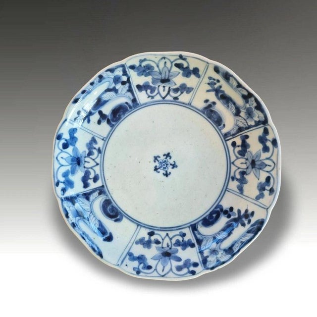 A fine early Japanese Arita porcelain dish dating to circa 1690 during the Edo period. The decoration incorporates...