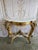 Elegant 19th-century French Louis XV style demi-lune console table, circa 1860-1880. The carved wood frame features...