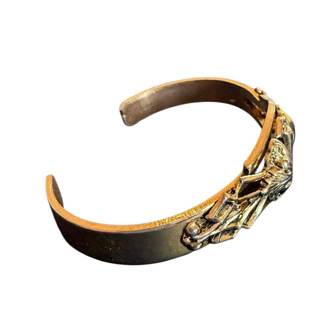 Vintage repousse cuff in the style of Whiting and Davis.