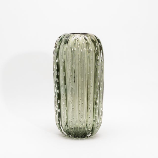 A striking fusion of organic form and Venetian mastery, this Hand-Blown Murano Cactus Vase in Fern Green with Bubbles...