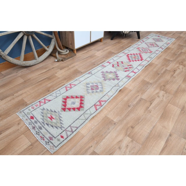 Vintage Turkish Oushak White Runner with Colorful Motifs For Sale - Image 11 of 11