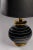 Monumental table lamp in black glass, with withe spyral detail and brass. The lamp was handcrafted in the late 1970 in...