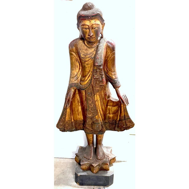 Monumental Giltwood Standing Buddha with Lotus Base, Burma (Myanmar), Late 19th–Early 20th Century Dimensions: 53" H × 23"...