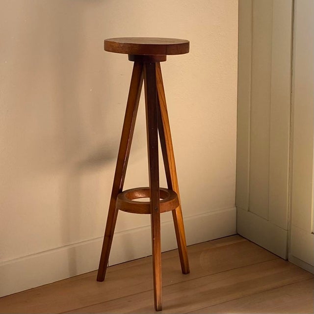 We're absolutely smitten with this vintage wooden side table. Its slender silhouette, delicate lines, and timeless charm...