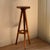 We're absolutely smitten with this vintage wooden side table. Its slender silhouette, delicate lines, and timeless charm...