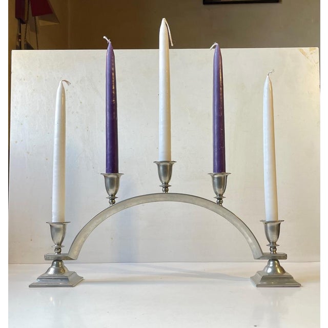 Important and very rare just andersen pewter candelabra in an arched design. Distinct architecturally inspired art deco...