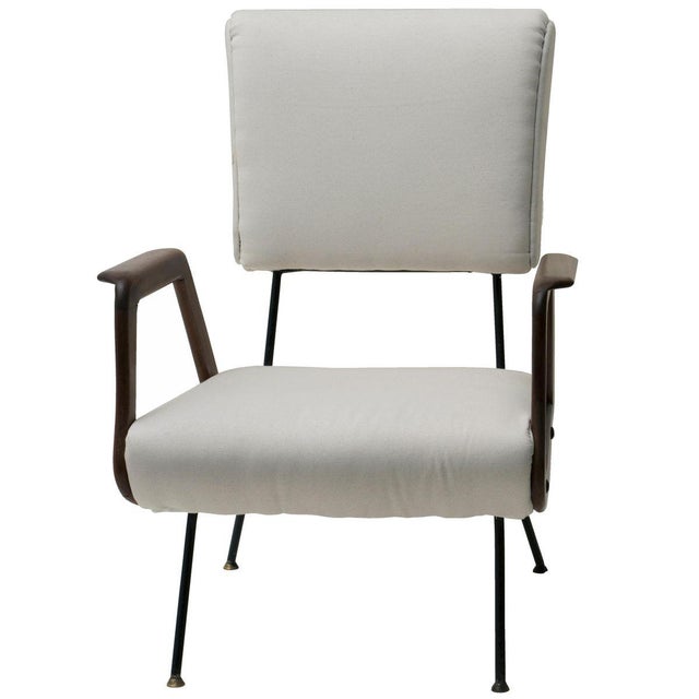 Structure in painted reinforcing steel and brass, wooden arms, padding dressed in cloth. 1950s. Very good condition.