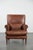 We are offering this attractive and comfortable armchair made of cognac-colored cowhide leather in English style. Thanks...
