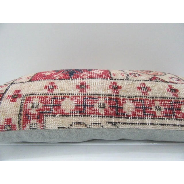 This is a pillow cover made from a vintage kilim rug. The piece was properly washed and ready to use. Pillow inserts not...