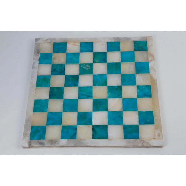 Beautiful vintage handcrafted stone chess board featuring striking turquoise blue-green and cream stone inlay squares...