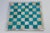 Beautiful vintage handcrafted stone chess board featuring striking turquoise blue-green and cream stone inlay squares...