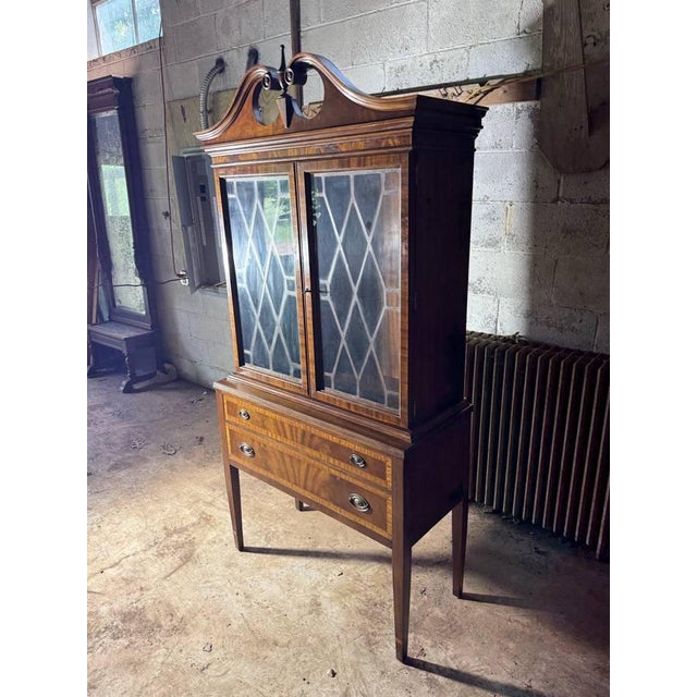 Vintage Federal Inlaid Mahogany Bookcase or Display Cabinet by The Wm Hengerer. , crafted with timeless elegance and...