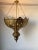 Oversize exquisite filigree openwork brass Moroccan Moorish chandelier in Alberto Pinto style. This exquisite Moroccan...