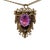 This is a fine Victorian period 14K gold and amethyst pendant decorated with seed pearls and scrolls. The amethyst is...