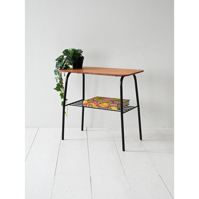 Vintage coffee table with pine top and black metal frame, typical of Nordic design from the 60s. Scandinavian coffee table...