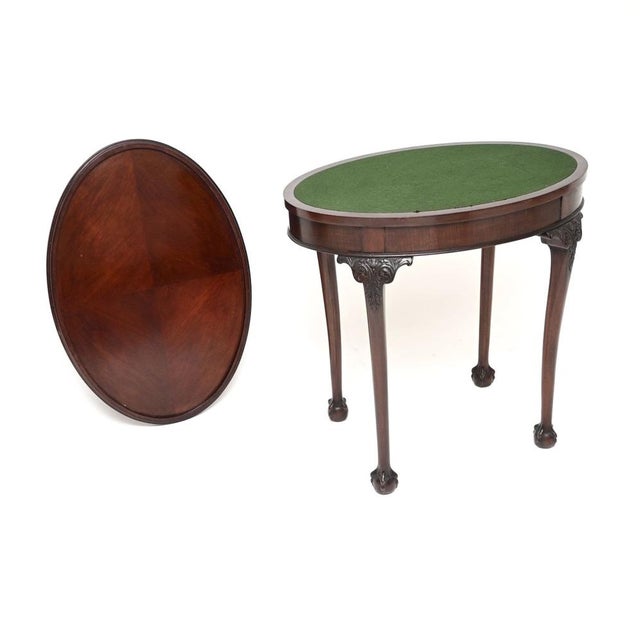 A lovely antique Edwardian satinwood occasional card table, made in England and dating from around 1900-1910. It is of...