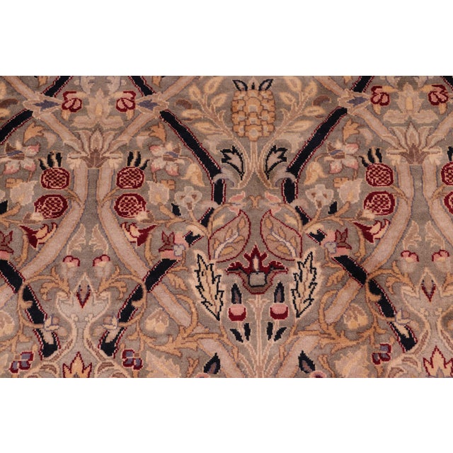 Designed with mesmerizing intricacy and gorgeous color palette, this hand-knotted masterpiece demonstrates the beauty and...