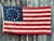 Blue Real Vintage Betsy Ross American Revolutionary Flag 13 Stars Cotton 1976 With Beautiful Naturally Faded Patina and Wear. For Sale - Image 8 of 8
