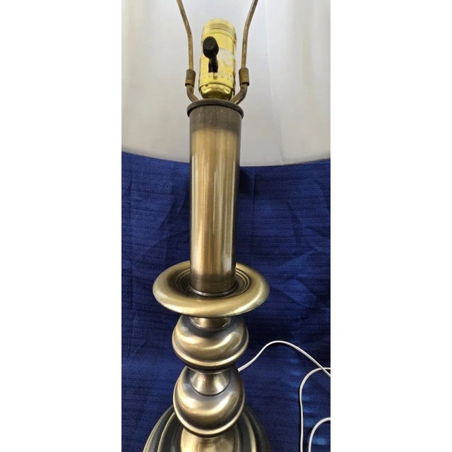 This lamp is in fantastic working condition and ready to be used. Dimensions: 27.5” Tall x 7” Diameter base x 15” Diameter...